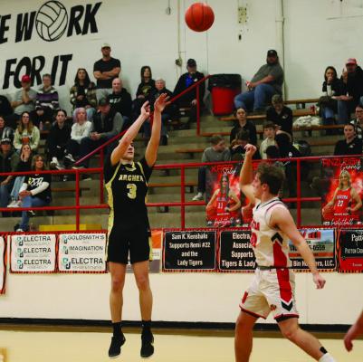 Wildcat senior Haegan Deerinwater launches a three in Archer City’s district road matchup versus the Electra Tigers on Friday, Jan. 24. Photo/Landon Davis
