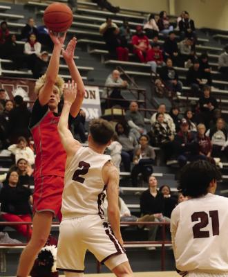 Holliday’s Ashtyn Berry drills a contested jump shot in the Eagles’ 51-50 win over the Vernon Lions on Tuesday, Jan. 21. Photo/Landon Davis