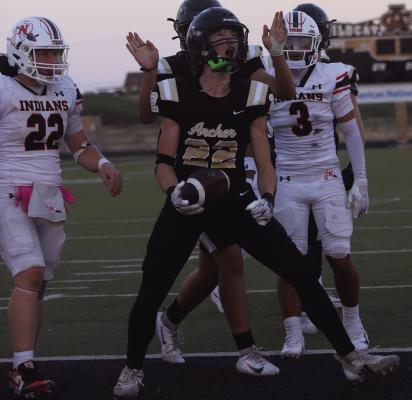 Archer City Junior Tanner Deerinwater celebrates following his five yard rushing touchdown in the Wildcats 37-6 loss to Nocona on Friday, Sept. 4. Photo/Nathan Lawson