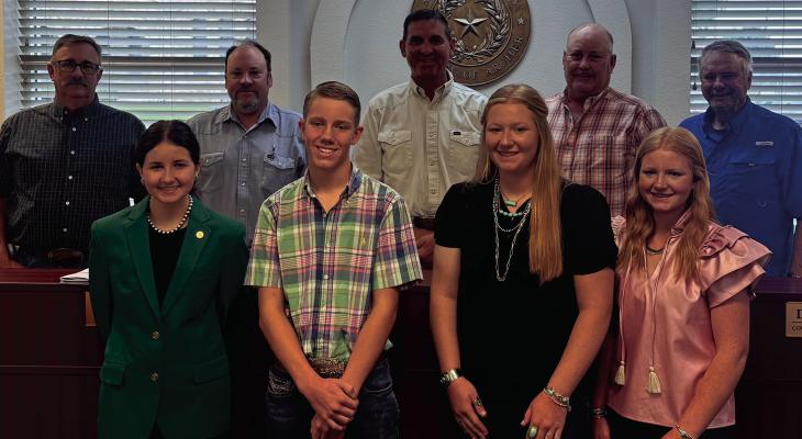 Front L-R Isabelle Parkey, Whit Parkey, Ava Dora and Ella Dora pose for a photo with the Archer County Commissioner's Court following presenting to them on Tuesday, May 27. Photo/Vanessa Parkey