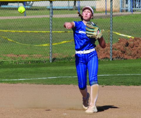 Trojanette shortstop Karissa Fillingim rifles a throw to first in Windthorst’s 16-0 win over Olney on Monday, March 24. Photo/Landon Davis