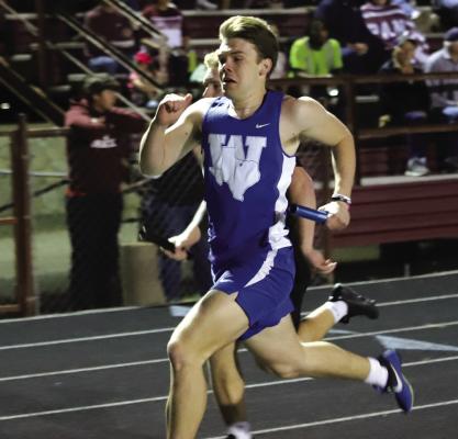Carson Anderle hits his stride for the Windthorst Trojans relay team during the Seymour track meet on Monday, March 4. Photo/Landon Davis