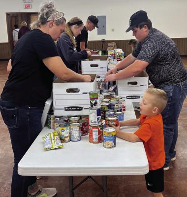 The Archer City 4-H club gathered 680 canned goods in October that were donated to the Archer Service Center. Courtesy photo