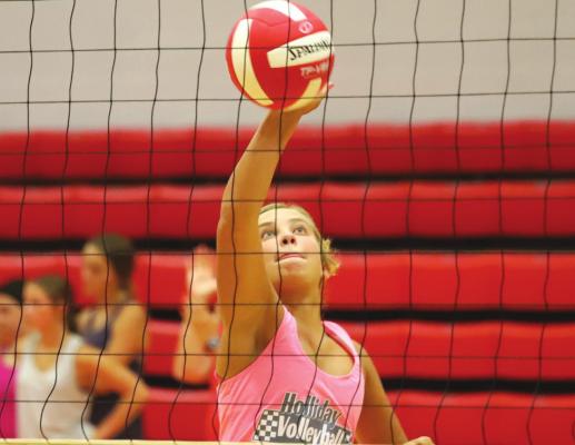 Holliday senior Belle Welch goes up for a tip in practice on Monday, Aug. 2. Photo/Will Edwards