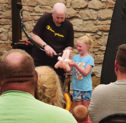 The Archer Public Library concluded its Summer Reading Program Performances in June with Rob Holladay's Magical Ballon Show on Wednesday, June 21, and Dynamic Dana: Science Wiz on Wednesday, June 28. Both shows took place in the Royal Theater in Archer City. Courtesy photo