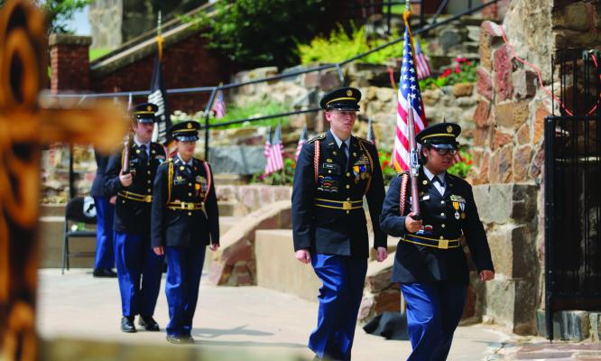 Members of the Wichita Falls Legacy High School ROTC program head to retire the colors as part of the Windthorst Memorial Day service program last year. The ROTC program will be a part of this year's program as well. File photo