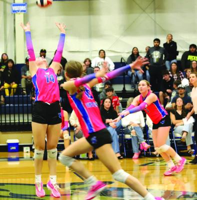 Windthorst Junior Violet West sets up hitters Megg Lindley and Kenley Teakell during the Trojanette's 3-0 Regional Semifinals win over Plains on Tuesday, Nov. 12 in Abilene. Photo/Landon Davis