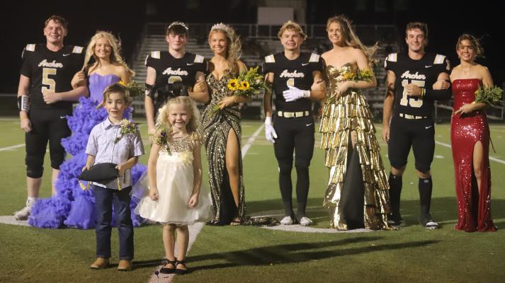 The Archer City High School homecoming court from left to right: Noah Reneau, Ashlyn Harvey, Homecoming King Gage McCord, Homecoming Queen Ella Golihugh, Brayden Tedrow, Jocelyn Tedrow, Seth Truette and Millie Mayo. Front: Kassidy Marin, crown bearer Brian Boone and flower girl Bristol Hughes. Photo/Nathan Lawson
