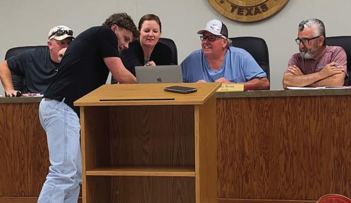 A Verkata sales representative goes over the security camera contract options for the city during its council meeting on Monday. Photo/Nathan Lawson