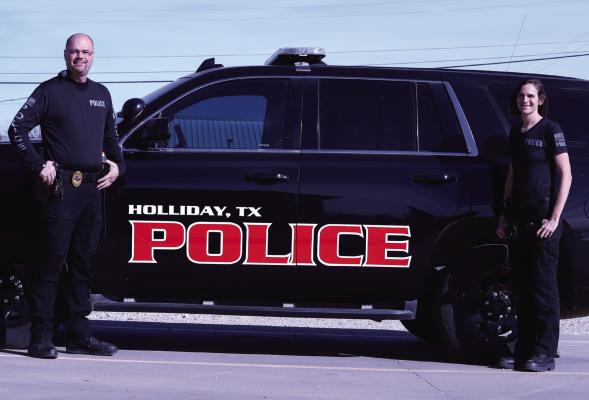New Holliday Police Chief Kayla Stevens (right) and Officer Chase Allison (left) remain committed to keeping the citizens of the community safe. Photo/Nathan Lawson