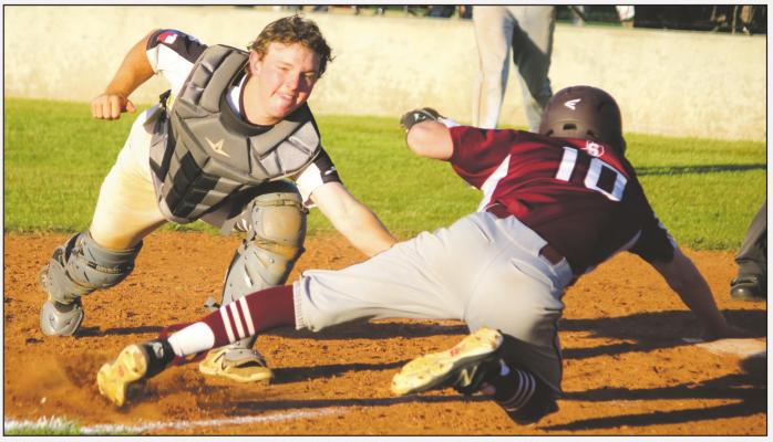 Archer City’s Jaxton Barrett applies the tag at the plate in the Wildcats’ 8-7 win over Seymour on Monday, April 19. Photo/Jerry Phillips