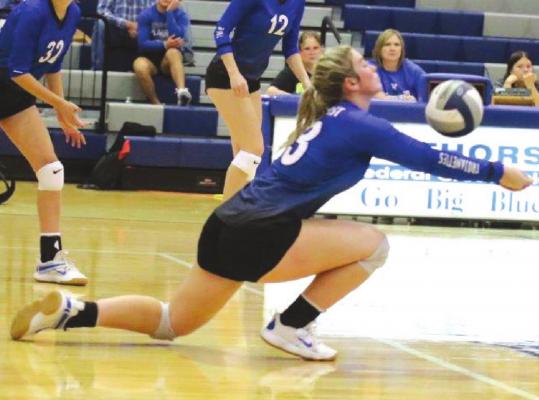 Windthorst junior Tara Tackett stretches for a dig in the Trojanettes’ 3-1 win over Bryson on Saturday, Sept. 25. Courtesy photo/Jamie Anderle