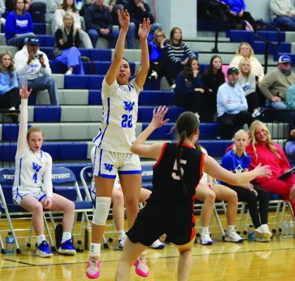Windthorst’s Camille Cabrera sends up a three over a Petrolia defender on Friday. Photo/Landon Davis