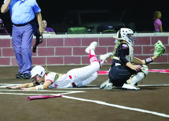 Holliday’s Ardyn Harrison scores a key run in the Lady Eagles’ district matchup with Bowie on Thursday, April 17. Photo/Landon Davis