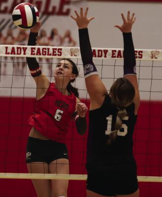 Lady Eagle hitter Camdyn Stapleton hammers down a kill against the Tigerettes on Tuesday, Sept. 9. Photo/Landon Davis