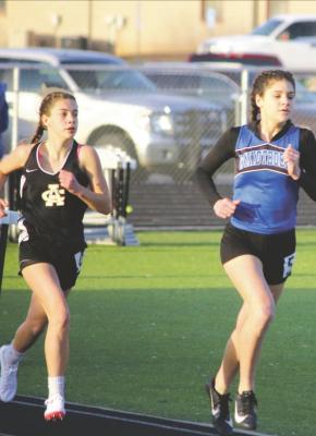 Windthorst’s Saige Anderson comes down the stretch in the 800 meters, followed closely by Archer City’s Landri Payne. Anderson finished second in the event while Payne came in fourth.Courtesy photo/Barbara Phillips