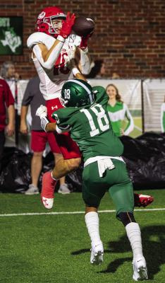 Holliday’s Hudson Dray elevates over a Breckenridge defender for a touchdown reception during the Eagles’ 43-0 drumming over the Buckaroos on Friday, Aug. 29. Courtesy photo/Jim Harrison