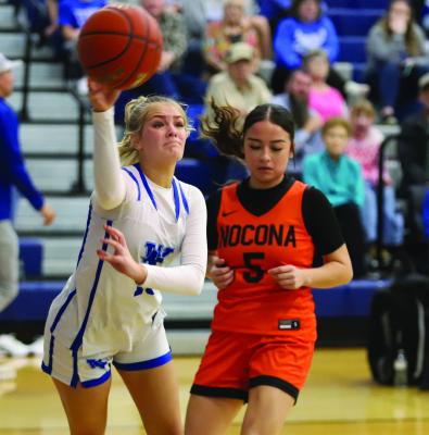 Windthorst’s Kinlee Anderle makes a tough pass from the baseline in the Trojanettes’ home matchup with Nocona on Tuesday, Jan. 6. Photo/Landon Davis