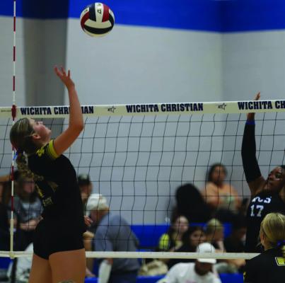 Lady Cats Senior Jocelyn Tedrow rises up for a kill attempt in Archer City's comeback win against Wichita Christian on Tuesday, Aug. 18. Photo/Rolando Medina