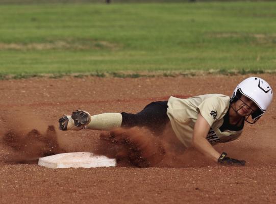 Archer City Freshman shortstop Millie Mayo slides into second base against the Lady Pirates. Photo/Landon Davis