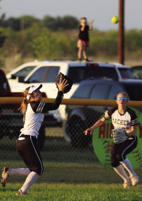 Leftfielder Emry Veitenheimer races to haul in line drive in Archer City’s road district game versus Petrolia on Monday, March 30.