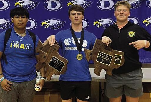 Windthorst's Wyatt Steinberger (middle) was named the Region 6 Division 4 Champion for the 148-pound weight class. Courtesy photo
