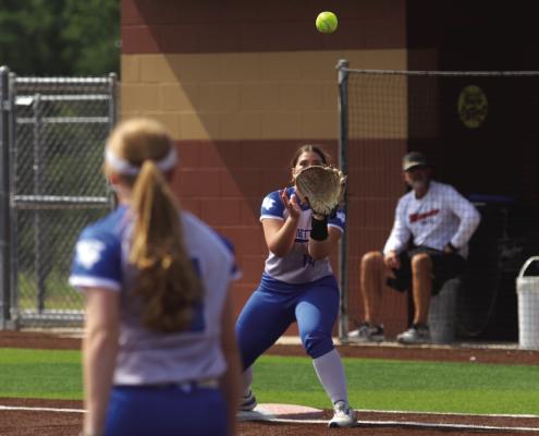 Windthorst first baseman Heidi Tackett reels in the throw for the out against Muenster in their Bi-District round match on Saturday, April 25. Photo/Landon Davis
