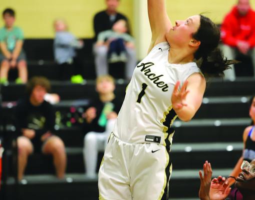Archer City Freshman MaKaylee McCown goes up for lay up against the Wichita Christian Lady Stars on Tuesday, Jan. 2. The Lady Cats won 42-15. Photo/Landon Davis