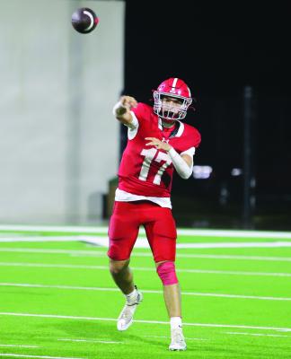 Eagle quarterback Landon Jones lasers a throw to his left on Thursday, Nov. 20, against the Tigers. Photo/Landon Davis