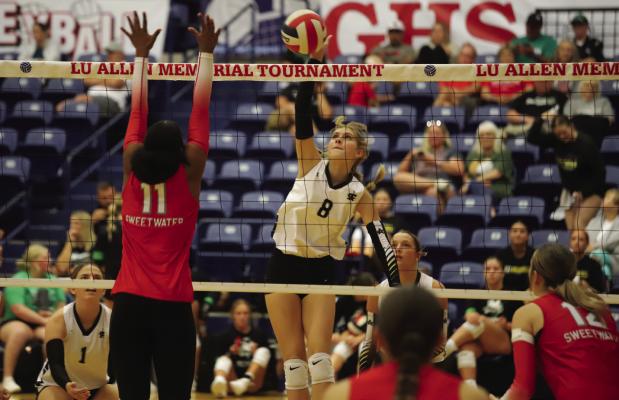 Freshman middle Lyla Nichols slaps down a kill in Archer City’s pool play matchup with Sweetwater in the 22nd annual Lu Allen Memorial Volleyball Tournament in Graham on Friday, Aug. 22. Courtesy photo