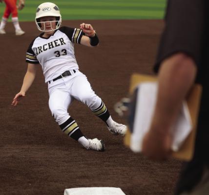 Archer City Sophomore Raynee Smith slides into third in the final inning of the Lady Cats 6-5 Game 2 loss to Honey Grove on Thursday, April 30, at NCTC. Photo/Nathan Lawson
