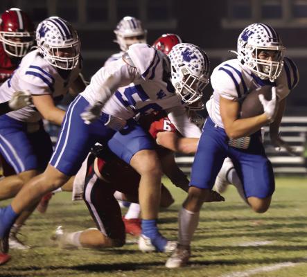 Windthorst running back Hunter Anderle eyes the endzone in the Trojan’s battle with the Electra Tigers on Friday, Nov. 1. The junior finished the night with 92 rushing yards and one rushing touchdown. Photo/Landon Davis