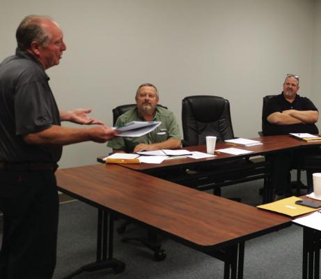 David Parkman with Edgin, Parkman, Fleming and Fleming presents the audit to the Holliday ISD school board. Photo/Jerry Phillips