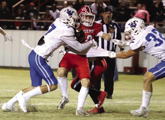 Trojans triumph over Tigers, 44-14
