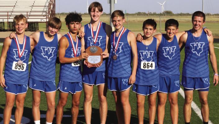 The Windthorst Trojan cross-country team of Braiden Messineo (4th), Kolton Rodgers (1st), Nolan Schreiber (2nd), Jackson Zicarelli (3rd), Luke Zicarelli (11th), Harrison Humpert (30th), and Carson Anderle (13th) took first place at the district meet in Seymour on Wednesday, Oct. 9. Photo Landon Davis