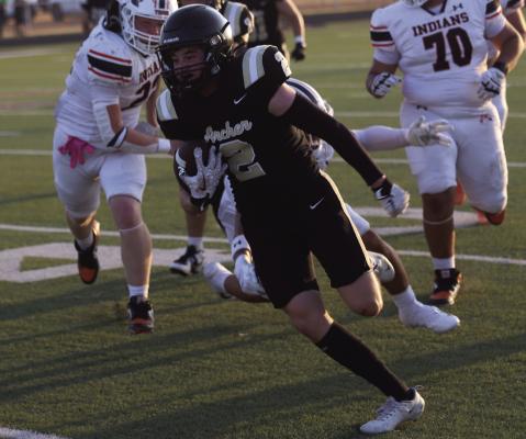 Archer City Senior Gage McCord looks for running room following a reception in the Wildcats loss to Nocona on Friday, Sept. 4. Photo/Nathan Lawson