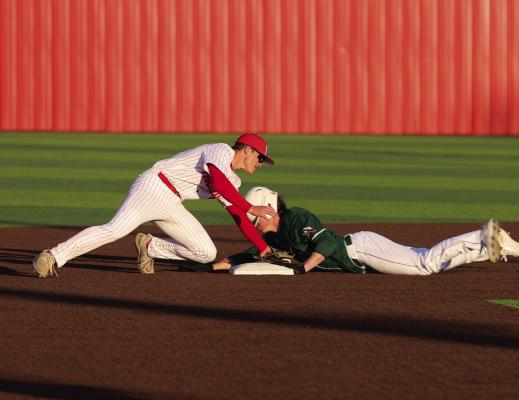 Holliday second baseman tags out a Breckenridge Buckaroo steal attempt during the Eagles 12-2 win on Monday, Feb. 17. Photo/Nathan Lawson