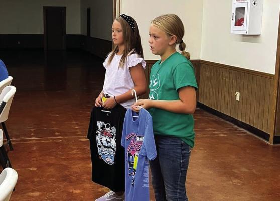 Tennysin Foster and Hannah Krenek represented the Archer City 4-H Club at the ACJLS Show Board meeting to petition the show board for in order for the club to sell merchandise at the ACJLS. Courtesy photo