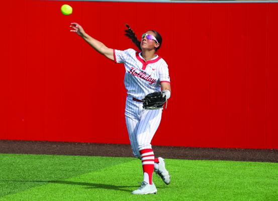 Rightfielder Bella Timms launches a throw to her cutoff in Holliday’s 2-1 series win over Peaster. Photo/Landon Davis