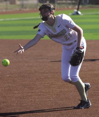 Jocelyn Tedrow flips the ball to first base for the out during the Iowa Park Tournament last weekend. Photo/Landon Davis