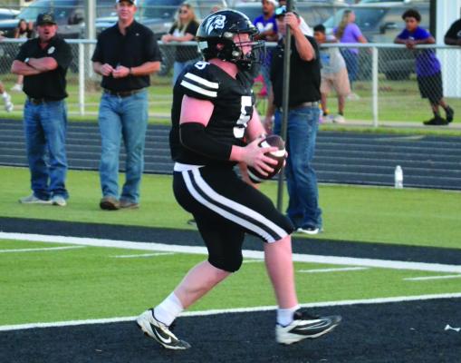 Sophomore Noah Reneau celebrates an early touchdown run against Munday on Friday, Sept. 26. Photo/Nathan Lawson