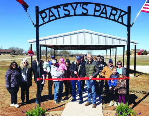 Members of the Lakeside City city council and the family of Patsy Johnson gathered for an intimate dedication ceremony. Pictured center are Paul Johnson (left) and Mayor Cory Glassburn (right). Courtesy photo