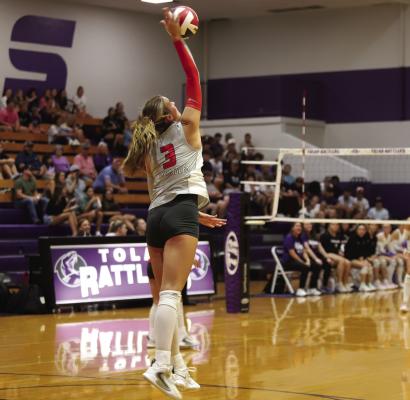 Holliday Senior Emma Ellis delivers a serve during the Lady Eagles 3-1 win over the Tolar Lady Rattlers. Photo/Rolando Medina