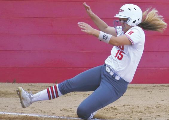 Holliday senior Kaitlynn Weatherread slides into home in the Lady Eagles’ 3-1 win over Brock on Friday, May 14, in Graham. Photo/Will Edwards