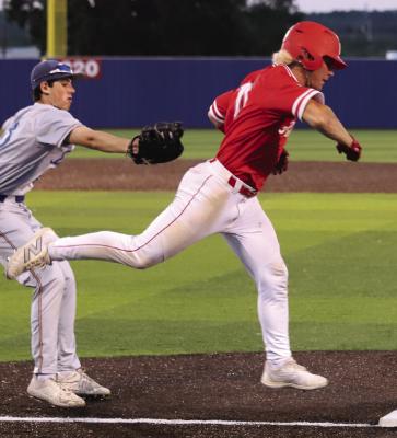 Holliday's Steele Skinner avoids the tag at first base during the Eagles Regional Quarter Finals loss to Brock on Friday, May 17. Photo/Landon Davis