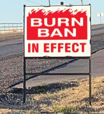 The county purchased 14 burn ban in effect signs which will be placed on Archer County signs on the major throughfares. Photo/Nathan Lawson