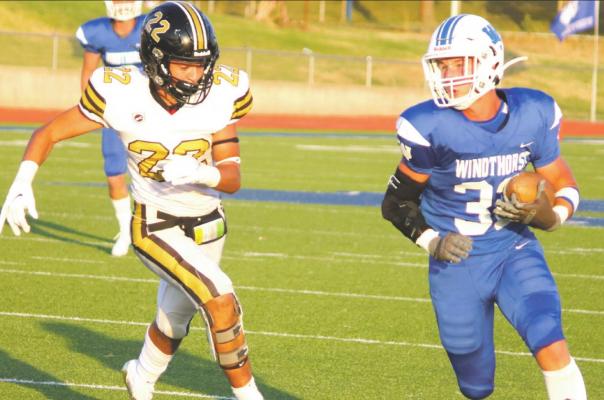Windthorst running back Haven Vieth (32) takes off with the ball during the Friday, Aug. 28, game against the Henrietta Bearcats. Photo/Jerry Phillips