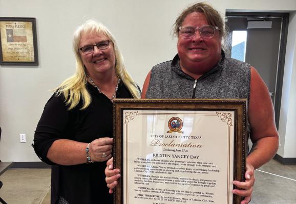 Lakeside City Mayor LeeAnn Burnett (left) presented Kristen Yancey with a proclamation declaring June 27 as Kristen Yancey Day in Lakeside City during the Lakeside City meeting July 21. Photo/Callie Lawson