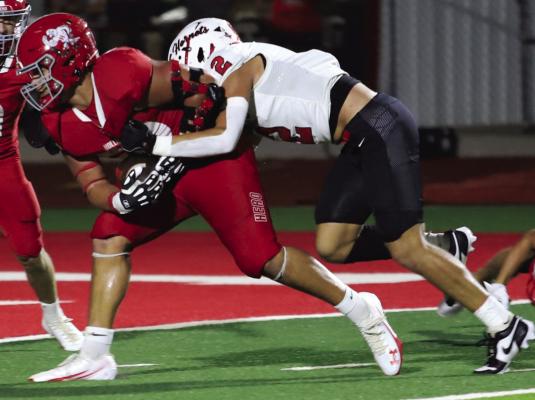 Eagle lineman Kreede Neal scored his first ever touchdown after blocking a Hornet punt in Friday night’s game. Photo/Landon Davis