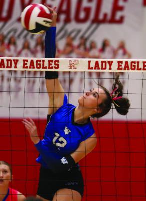 Trojanette middle Kyah Frank thumps a kill against the Holliday Lady Eagles on Monday, Sept. 22. Photo/Landon Davis